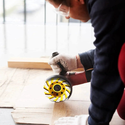 Worker using 4 Inch Turbo Diamond Grinding Cup Wheel With 12 Segments For Concrete Tile Marble And Rock with angle grinder