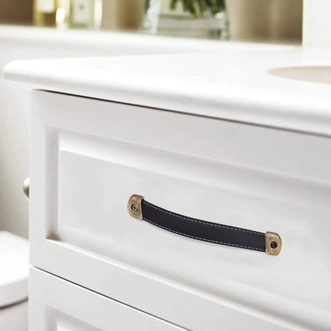 Two Pack Black Leather Drawer Handles With Mounting Screws For Cabinets, Drawers, Trunks And Suitcases installed on white drawer