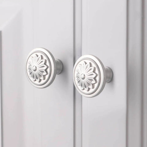 4 Pack Brushed Nickel Cabinet Hardware Knobs, 1.4 Inch Round Drawer Pulls For Cabinets And Dressers, installed on white cabinet