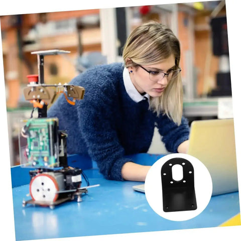 Person working on robotics project with 4 Pack DC Gear Motor Mounting Brackets L Shape Fixed Seat Holder visible