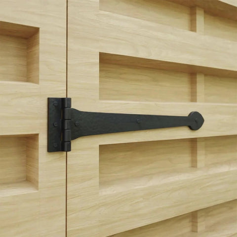 15 Inch Black Wrought Iron Strap Hinge With Spade Tip Heart Style installed on wooden door