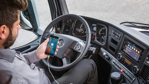 Driver using CarPlay USB A To USB C Cable For iPhone 17 16 15 And iPad Pro to connect phone to dashboard