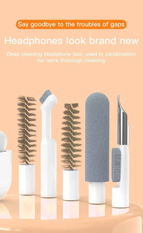 32-In-1 Compact Electronics Cleaning Kit tools for headphones, featuring brushes and sponges for thorough cleaning.