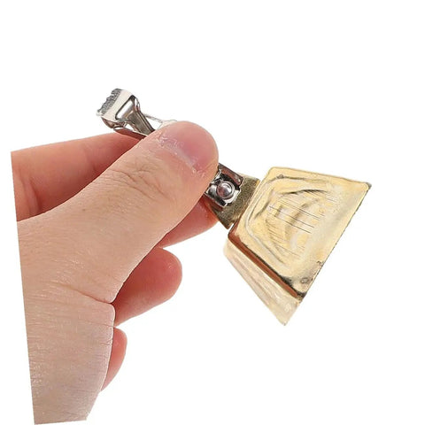 Hand holding a Stainless Steel Clip On Fishing Rod Bite Alarm Bell with Loud Ringing Sound for Carp Fishing