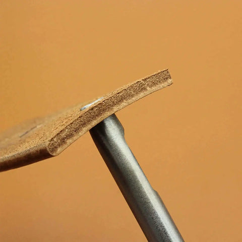 Close-up of 9 Size Oval Leather Hole Punch Set Carbon Steel Pro Grade Hand Punch Tool Kit in use on leather
