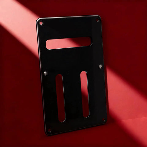 Durable PVC Electric Guitar Rear Panel Cover Plate with secure fit backplate for electronics on red background