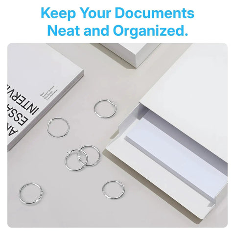One Inch Binder Rings Set Of Fifty With Nickel Plated Metal Rings Includes Key Ring Clip And Hole Puncher shown with documents