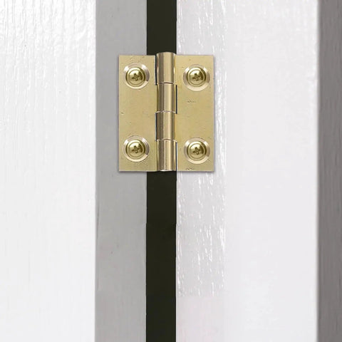 Foldable Brass Cabinet Door Hinges for Kitchens and Closets Small Door Hardware Thickened Design for Smooth Operation and High Load Capacity Includes Screws Durable Brass Construction for Cabinets Wardrobes and Cupboards installed on a white door.