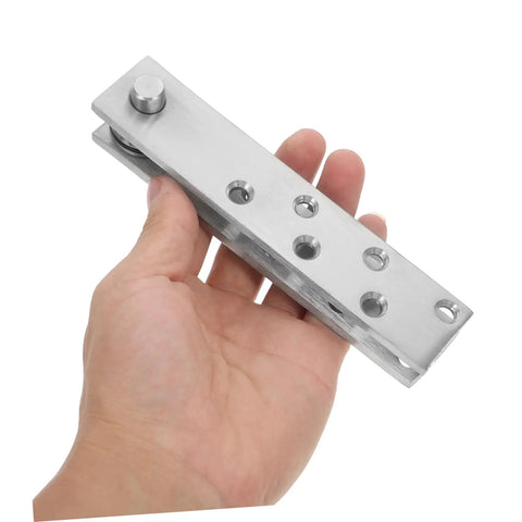 Hand holding 360 Degree Stainless Steel Invisible Pivot Hinges for Secret Bookcase Doors Heavy Duty Concealed Door Hardware
