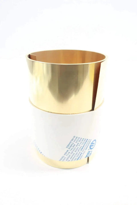 Brass Shim Stock Roll 6 Inch By 100 Inch 0.015 Inch Thick standing on white surface