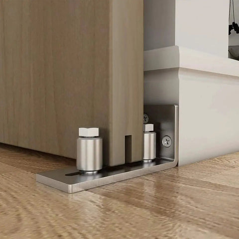 Stainless Steel Sliding Door Guide For Barn Doors 1 Pack With Flush Bottom Design Fits Doors Up To Two And One Eighth Inches Thick Durable Floor Guide Quiet Operation 304 Stainless Steel Rollers Ideal For Modern Interiors installed on wooden floor