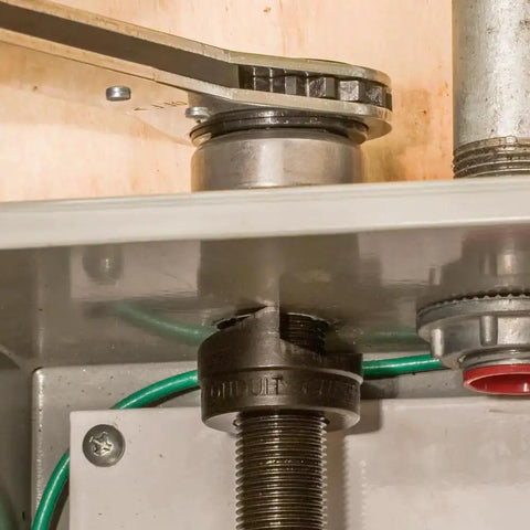 Optimized Design 10 Gauge Mild Steel Knockout Punch Set With Black Finish Half Inch Punch And Die in use on electrical panel