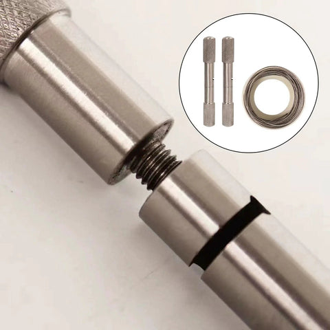 Close-up of manual camping rope and dehorning wire with handles for animal handling and outdoor gear.