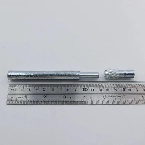 3/8 Inch 16 Internal Thread Drop In Anchors Zinc Plated Wedge Anchors with ruler in background for scale, concrete fastening tools.