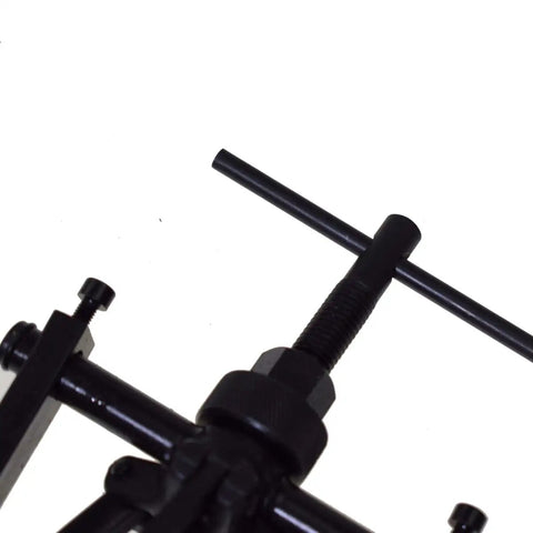 Close-up of Beefy Three Jaw Inner Bearing Puller Set With Jaw Pilot Bearing Puller Bushing Gear Extractor tool in black metal.