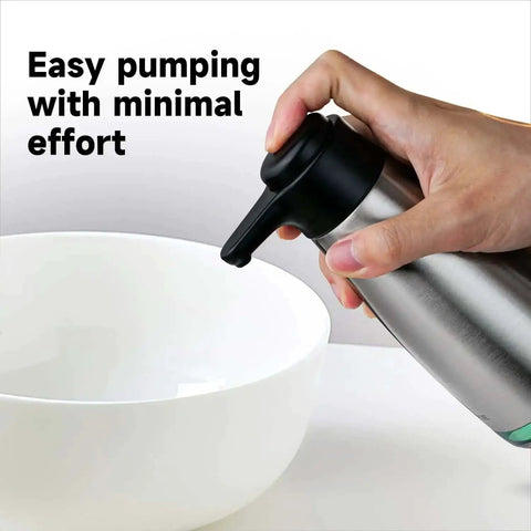 Person using Stainless Steel Liquid Soap Dispenser 15 Fl Oz For Dish And Hand Soap No Fuss Pump Top Lifts Off For Easy Refill near bowl