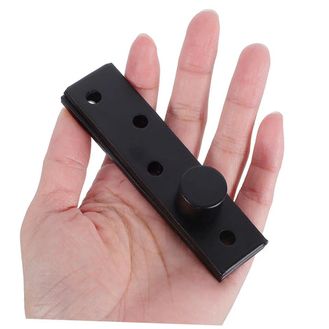 Slick Hidden Door Hinge For Concealed Aesthetics 360 Degree Heavy Duty Stainless Steel Pivot Hinge in hand for size reference