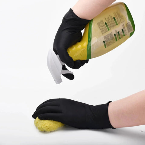 Nitrile Exam Gloves Latex Free Powder Free Disposable For Medical Use worn while cleaning with spray bottle and scrub pad