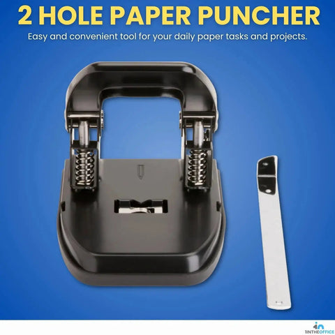 Two Hole Punch For Office Use, Heavy Duty Workhorse Desk Punch, black puncher with removable chip tray and rubber base on blue background