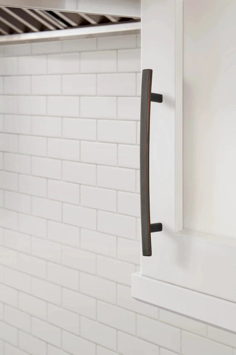 Cyprus Oil Rubbed Bronze Cabinet Pulls Six And Five Sixteenths Inch Center To Center installed on white kitchen cabinet