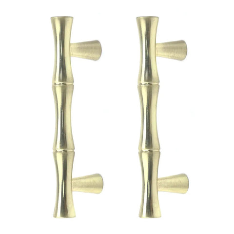Set of four bamboo shape cabinet pulls in brushed gold finish, shown vertically, 2.5-inch center hole, 3.7-inch total length.