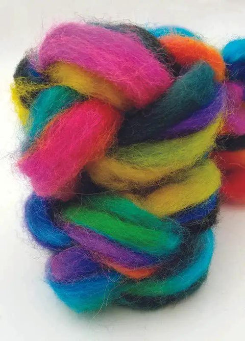 Colorful wool roving with vibrant pink, green, yellow, and blue hues, suitable for dyeing with Jet Black Acid Dye for protein fibers.