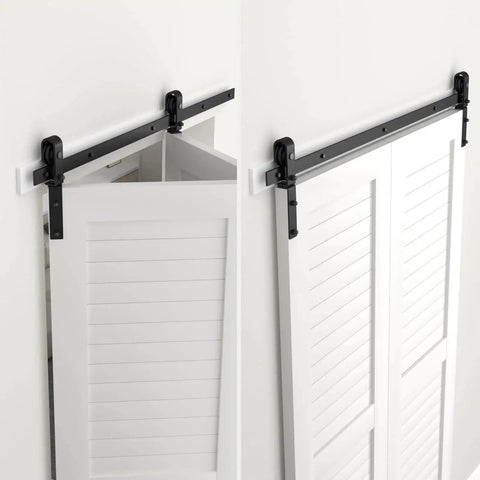 30 Inch Bi Folding Sliding Barn Door Hardware Track Kit with smooth quiet operation, side mounted black rollers, installed view.