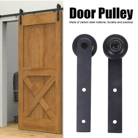 Two Pack Sliding Door Track Rail Pulley Wheel Rollers Barn Door Hardware Kit Heavy Duty Carbon Steel For Ultra Smooth Quiet Glide And Space Saving Sliding Door System For Kitchen And Home, featuring a close-up of carbon steel pulley wheels next to a wooden barn door on track.