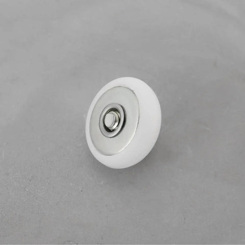 Close-up of a single 8 Piece Oval Edge Shower Door Roller with 19mm diameter and 6mm thickness for glass shower doors.