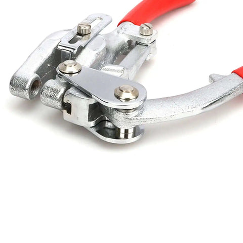 Close-up of Beefy Heavy Duty Hand Held Power Hole Punch Set For Sheet Metal; chrome vanadium steel tool with red handle.