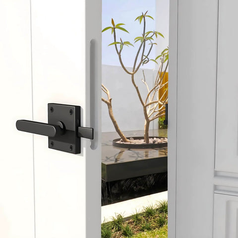 Rugged Matte Black Gate Latch With Double Sided Self-Locking Aluminum Gate Hardware for outdoor gates installed on white door