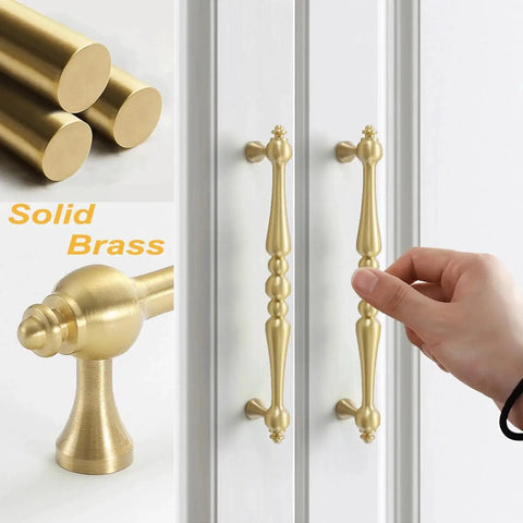Two Pack 5 Inch Center Solid Brass Cabinet Pulls In Vintage Gold Brushed Finish For Drawers Dressers Cupboards Wardrobes And Kitchen Cabinets Durable Rust Resistant Hardware For Furniture, front view with hand pulling
