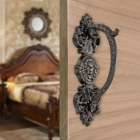 Heavy Duty 2 Pack 5.46 Inch Dark Brown Cast Iron Barn Door Handles Rustic Vintage Gate Fence Outdoor Garage Closet Cabinet Drawer Pulls Sturdy Rust Resistant Long Lasting With Retro Charm on a wooden door with a vintage bedroom setting.