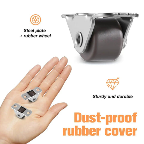 Close-up of Mini Half Inch Fixed Casters With Metal Top Plate, 16 Pack, shown with hand for scale, dust-proof rubber cover visible.