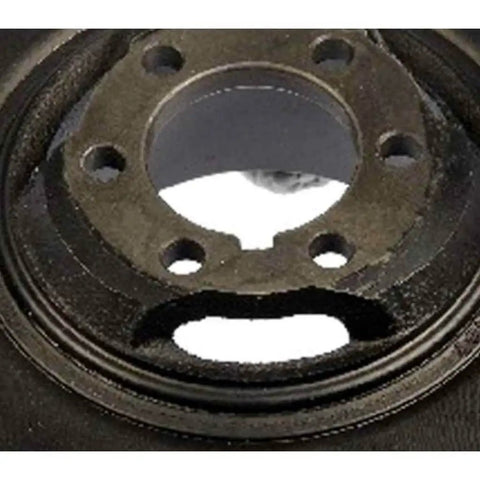 Close-up of black harmonic balancer for Kia Sportage 1995 to 2002, showing six-hole design and keyway for serpentine drive belt