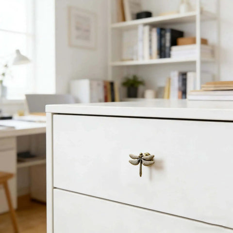 Dragonfly Drawer Knobs Set 6 Pieces in Ancient Gold installed on a modern white dresser in a home office, zinc alloy wing detail.