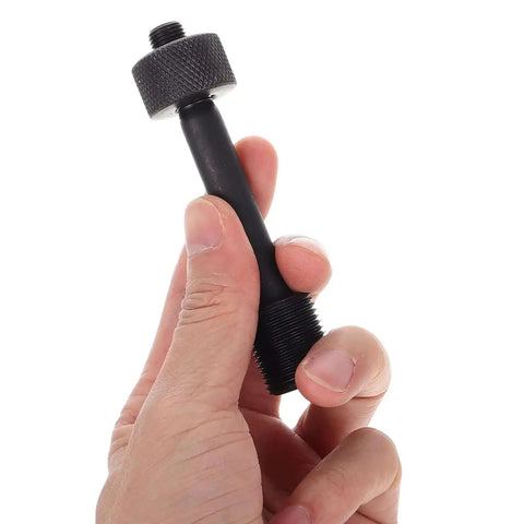 Person holding a component of the Hydraulic Hole Punch Kit With Locking Draw Bar And Manual Hole Punch Set For Metal Sheet And Electrical Conduit
