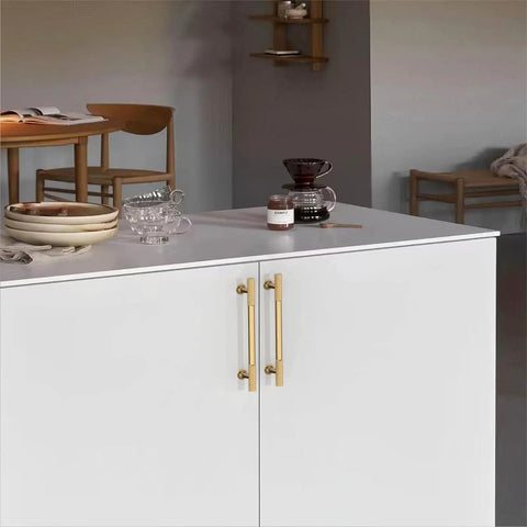 Installed Ten Pack 5 Inch Cabinet Handles With Champagne Bronze Finish For Kitchen Cupboards and Wardrobes on white cabinetry.