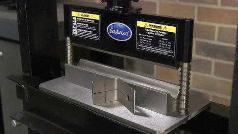 Heavy Duty Press Brake Attachment for 12 to 20 ton hydraulic shop presses, brick wall background