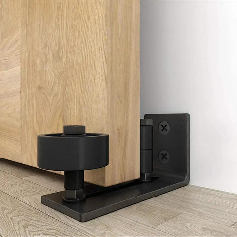 Sliding Barn Door Floor Guide And Wall Mounted Hardware with Flush Bottom Adjustable Stay Rollers fitting a wooden door.