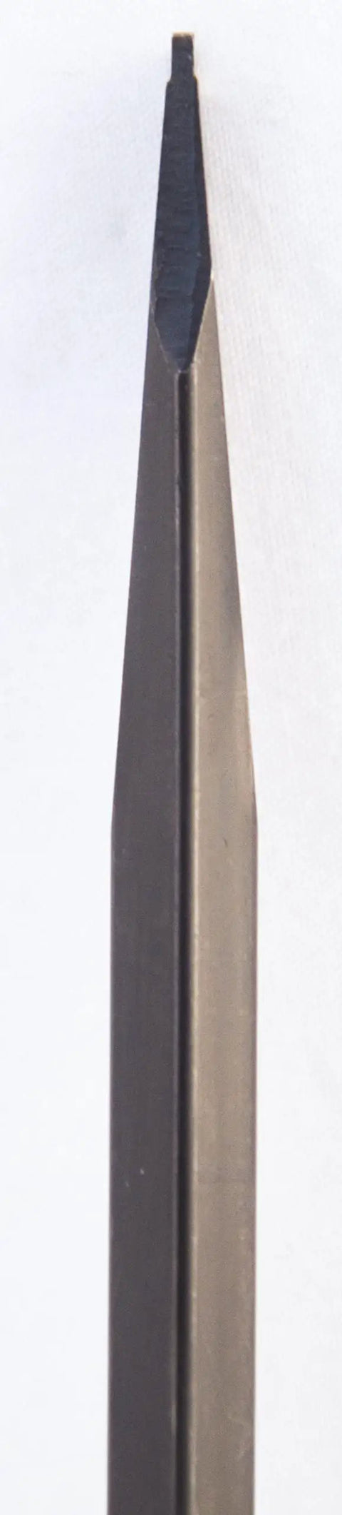 Close-up of a precision hollow-ground square blade bit from the Pro Grade Gun Care Screwdriver Set For Gunsmithing And Woodworking.