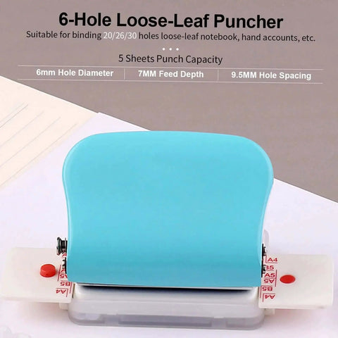 Handy 6 Hole Puncher for A4 A5 B5 Notebooks and Scrapbooks displayed on a desk, showing a portable handheld metal circle paper punch with 5 sheet capacity.