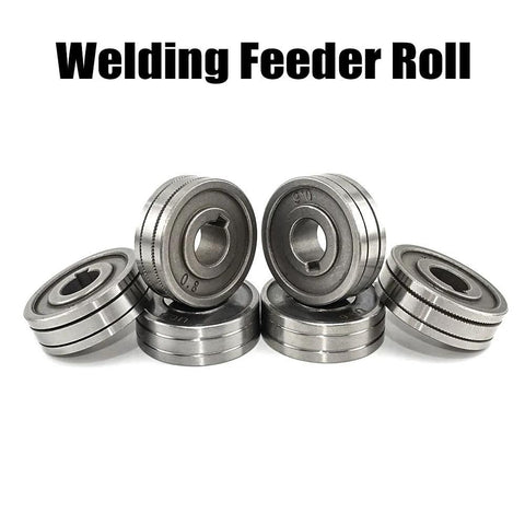 Set of seven metal MIG/MAG welding wire feed rollers with knurl grooves and central bore