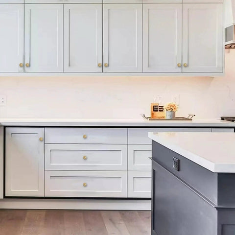 2 Pack 2.5 Inch Brushed Brass Cabinet Knobs With Vintage Backplates installed on white kitchen cabinets