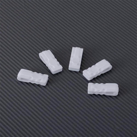 Top view of 10 Pack Vacuum Bag Clips With Sliding Grip For Tight Seals on dark surface