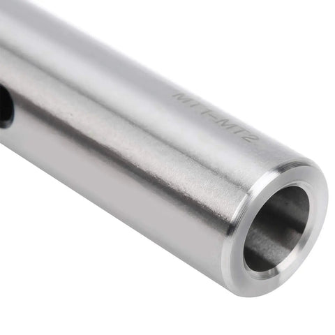 Close-up of a silver taper drill sleeve adapter in high-speed steel with hollow bore