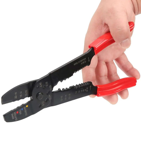Person holding All In One Crimping Pliers Heavy Duty For Wire Terminals Multi Function Manual Hand Tool with red ergonomic grip
