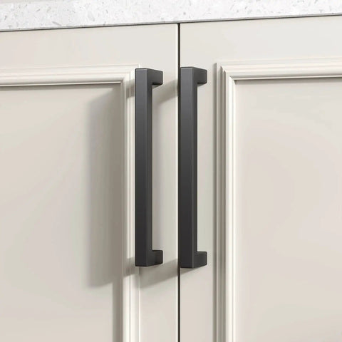 Front view of installed 30 Pack Black Square Bar Cabinet Pulls Drawer Handles Stainless Steel Hollow Construction Center To Center 5 Inch 128mm Overall Length 140mm Modern Kitchen Hardware Cupboard Durable Finish Anti Corrosive For Long Lasting Use on white cabinets.