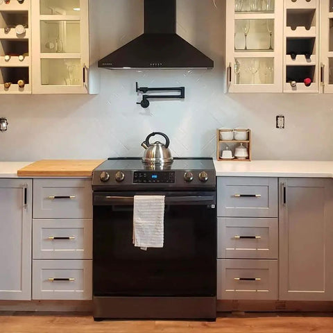 Modern kitchen with Gold And Black Knurled 5 Inch Center Bar Cabinet Pulls Set Of 10 Aluminum Handles on white cabinetry.