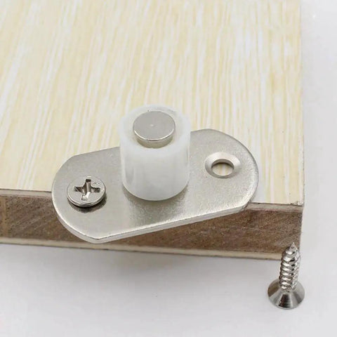 Sliding Barn Door Nylon Guide Wheel Set 4 Pieces With Floor Guide Roller Bracket installed on wooden surface with screws